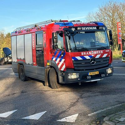 Brandweer bij woningbrand